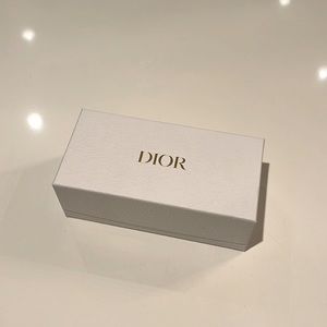 Christian Dior Sunglasses blue and black in original packaging. Never worn.